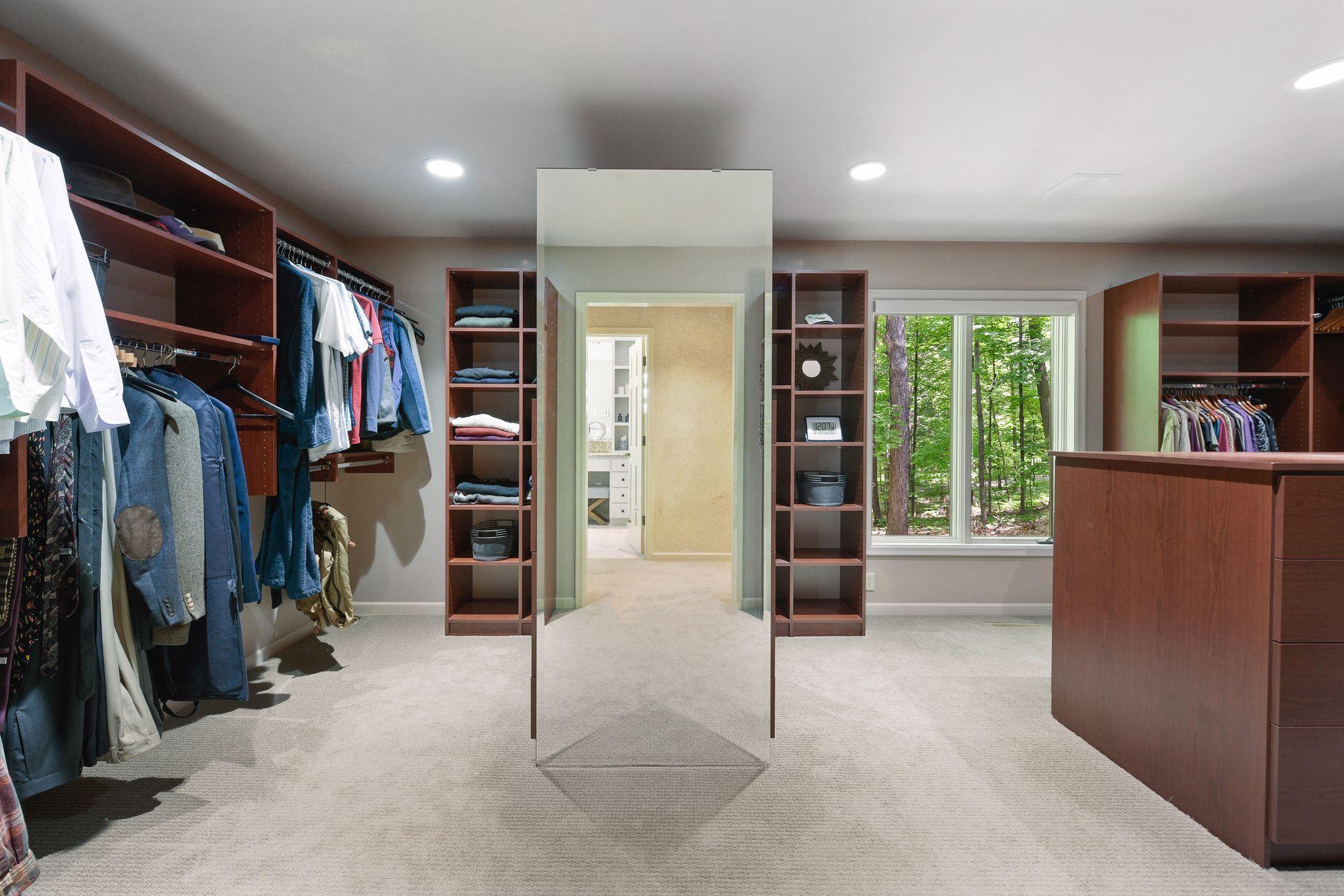 Incredibly spacious walk-in closet(room).