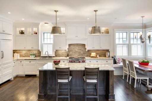 Kitchen of another home built by the same builder with similar finishes - concept only, not final product.
