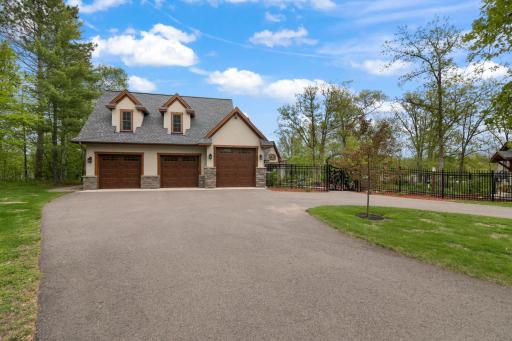 3 Car Attached Garage, 2- 8' tall Doors, 1- 10' Tall