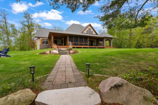 Beautifully landscaped walkway to the lake