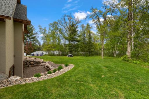 Beautifully landscaped area with egress windows