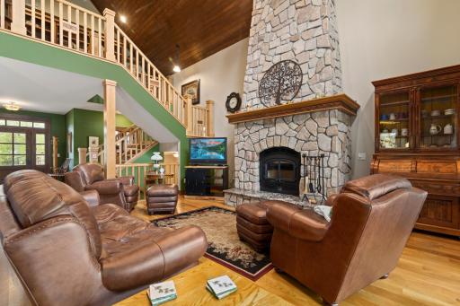 2 story vaulted ceiling with wood burning fireplace