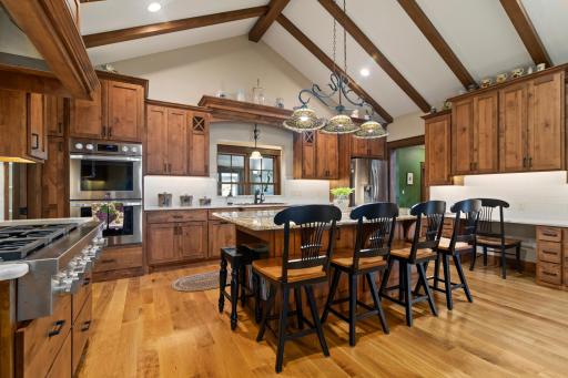 Custom kitchen with built in double wall ovens