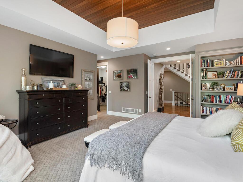 8' ft double doors and private hall welcome you to your retreat. 244 Broadway Ave N Wayzata MN 55391