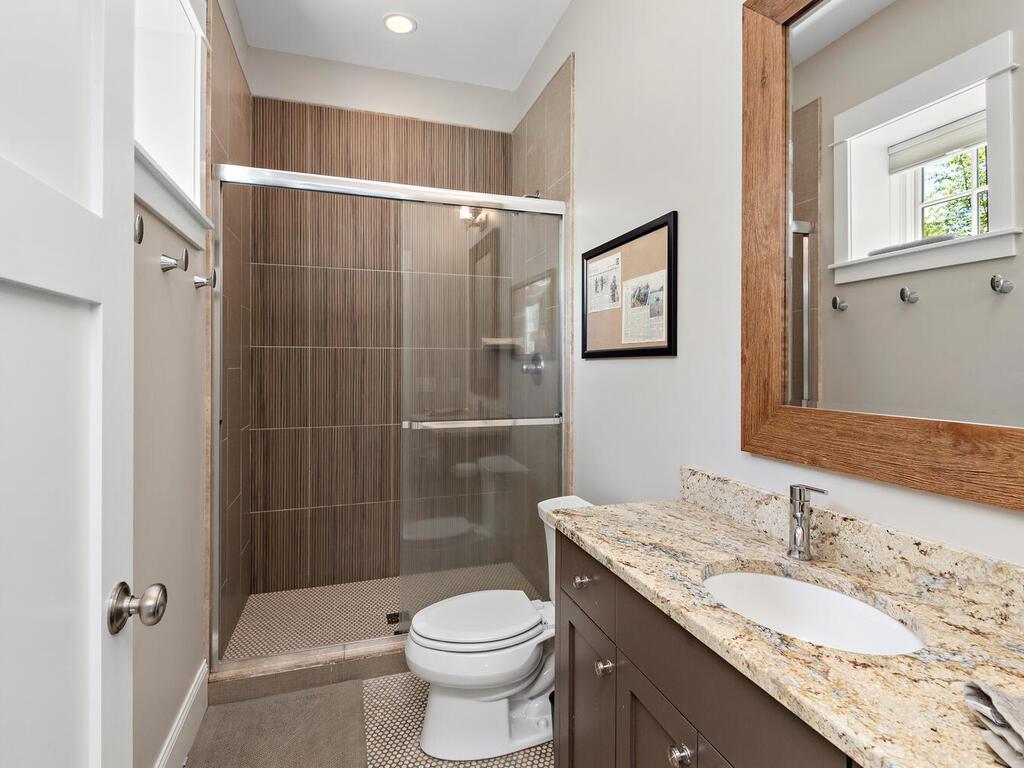 Private en suite bath for 3rd bedroom. The custom designed walk-in closet offers identical cubic space. 244 Broadway Ave N Wayzata MN 55391