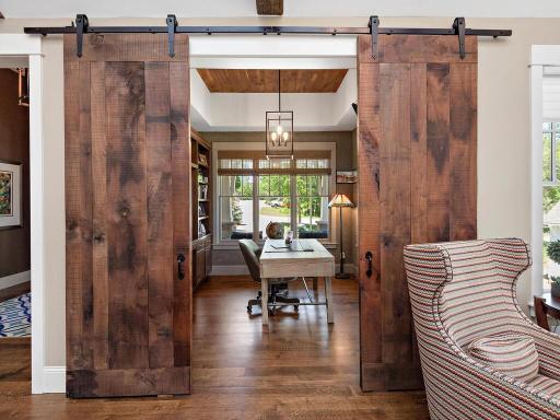 Main floor office cloaked by 8’ tall custom barn doors. 244 Broadway Ave N Wayzata MN 55391
