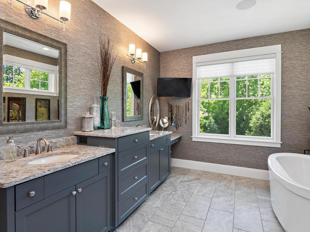 Spa bath w/ heated floors, expansive walk in closet and adjacent laundry room. 244 Broadway Ave N Wayzata MN 55391