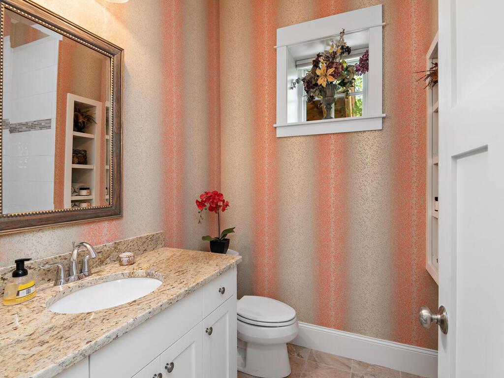 3/4 guest bath buffers the 3rd and 4th bedrooms on LL. 244 Broadway Ave N Wayzata MN 55391