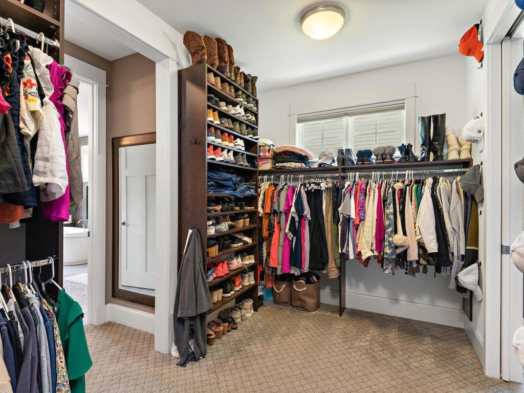 Spa bath leads to massive walk-in closet. Conveniently walk through to the main floor laundry room. NOTE: Lower Level also pre plumbed for 2nd laundry. 244 Broadway Ave N Wayzata MN 55391