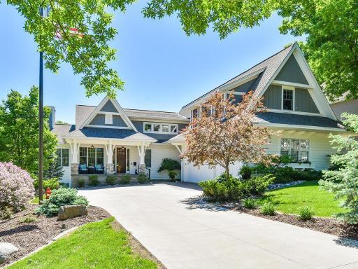 This gorgeous property offers the unique benefit of paved walkways leading from your front door to the shores of Lake Minnetonka. Your private drive invites plenty of off street parking. Street parking is ok too! 244 Broadway Ave N Wayzata MN 55391
