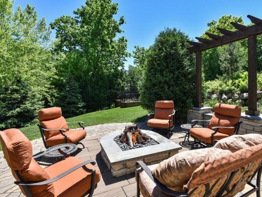 McCullough Design demonstrates creativity and bold design with this extraordinary custom paver patio and gas fire pit! The Pergola is wired and ready for outdoor theatre. 244 Broadway Ave N Wayzata MN 55391