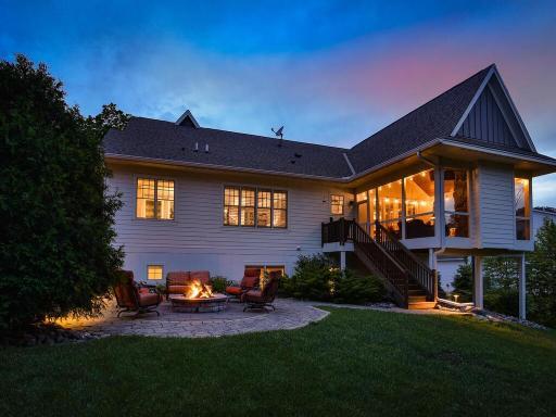 Eye level view from Southeast corner of the grounds. There are 2 raised gardens in this corner. The eastern border is framed by privacy bushes ard elevates well above the neighboring estate. 244 Broadway Ave N Wayzata MN 55391