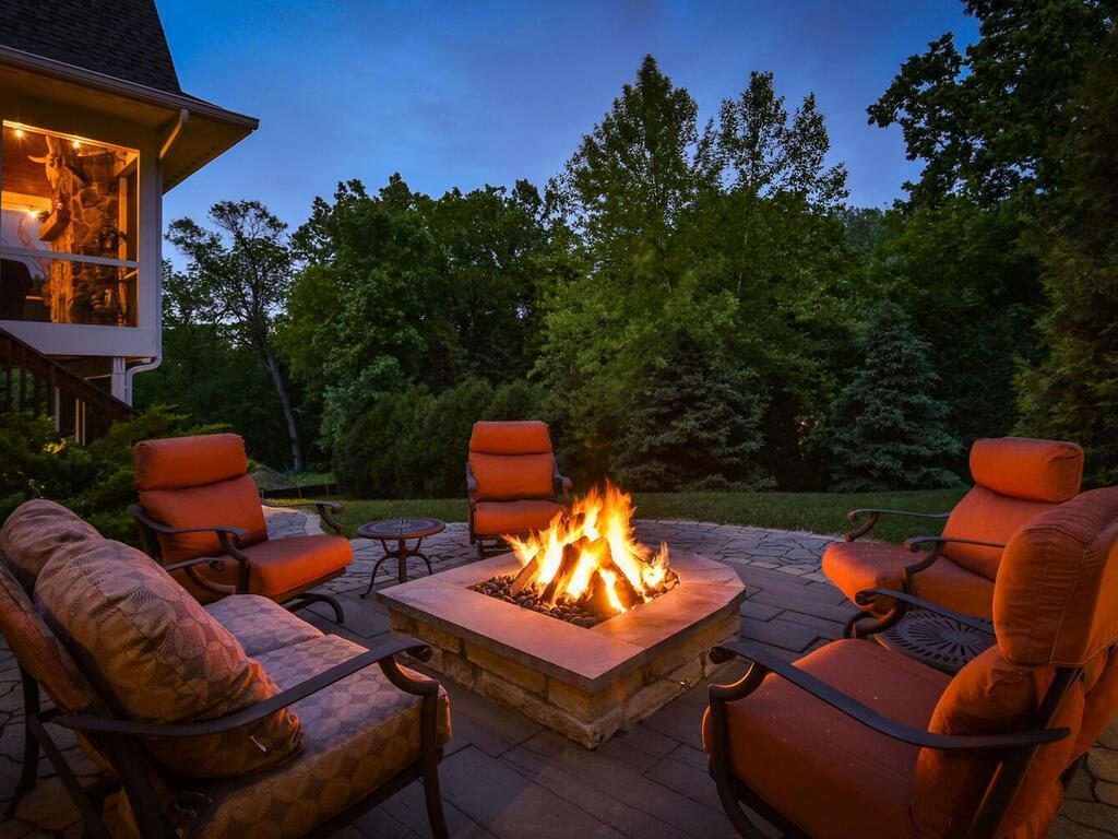 If only one could snap your fingers and teleport your campfire from up north to your backyard. Done! Imagine Aspen Co. We pay homage to McCullough Design for this extraordinary custom paver patio and gas fire pit!