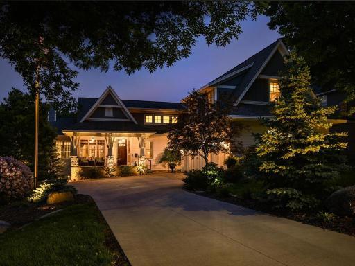 Resting on nearly 1/2 and acre. This 110 ft wide lot is adorned by an Exterior lighting design you must see to believe! Designed and installed by Erickson Lighting. 244 Broadway Ave N Wayzata MN 55391