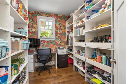 Walk in pantry strategically placed to welcome the morning sun. Wanna get away ;). Built-ins include heavy duty pull out drawers as well. 244 Broadway Ave N Wayzata MN-large-028-039-Broadway Ave N36-1498x1000-72dpi.jpg