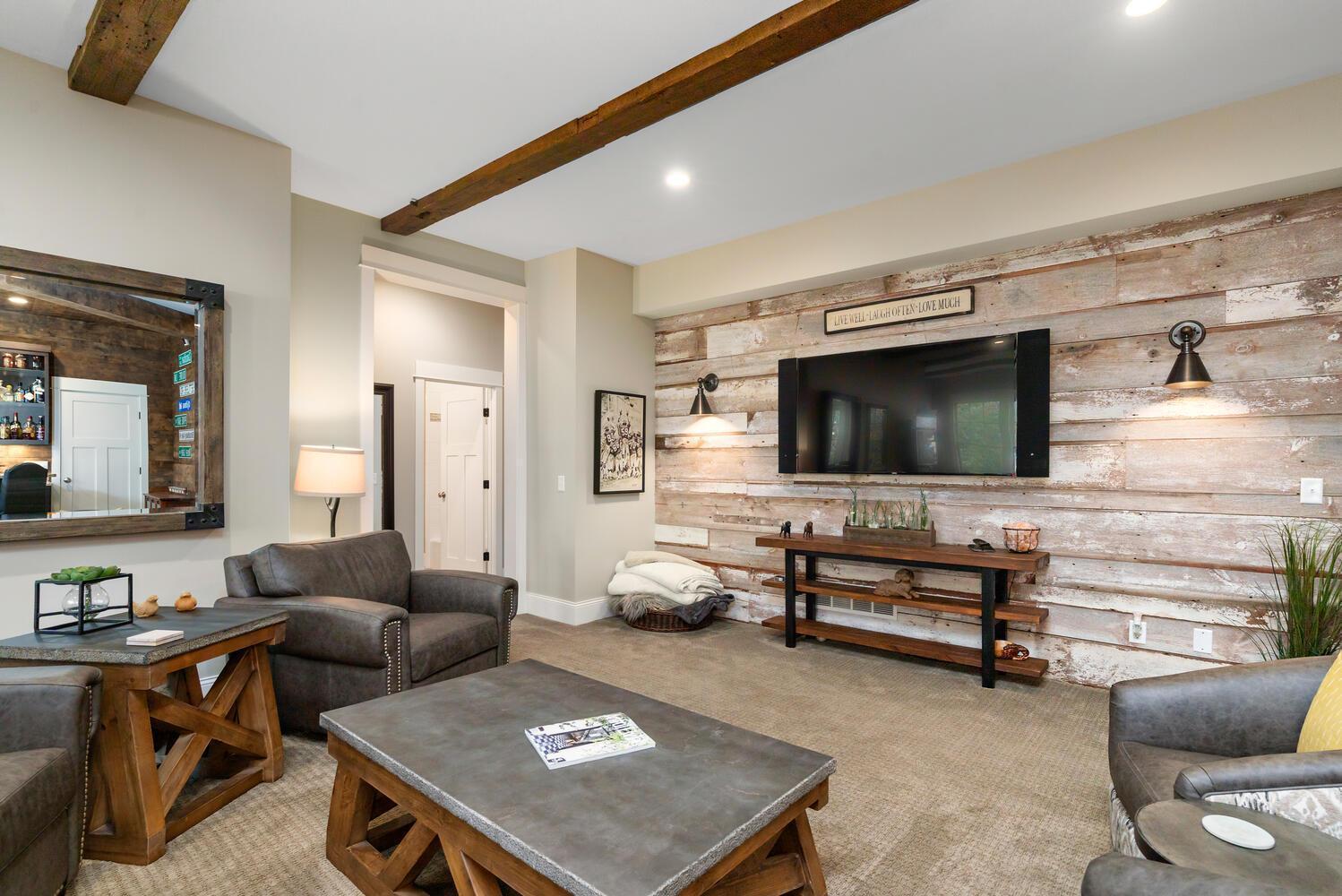 Beyond the family room rests the two lower level bedrooms. Buffering the bedrooms is the 4th of 5 baths which serves the bedroom to the left. The bedroom on the right offers 3/4 en suite and walk-in custom closet. 244 Broadway Ave N Wayzata MN 55391