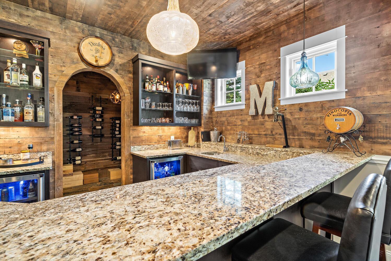 Dual Marvel Under-counter beverage centers. Recessed sink. Granite Countertops. 244 Broadway Ave N Wayzata MN 55391