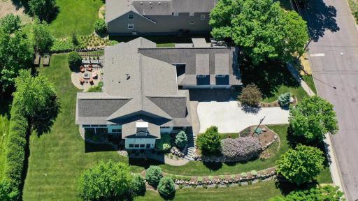 Overhead drone shot illustrates the .42 acre / 110 foot wide lot. One of only 6 lots throughout the entire village, this size or larger. #ReturnOnInvestment! 244 Broadway Ave N Wayzata MN 55391