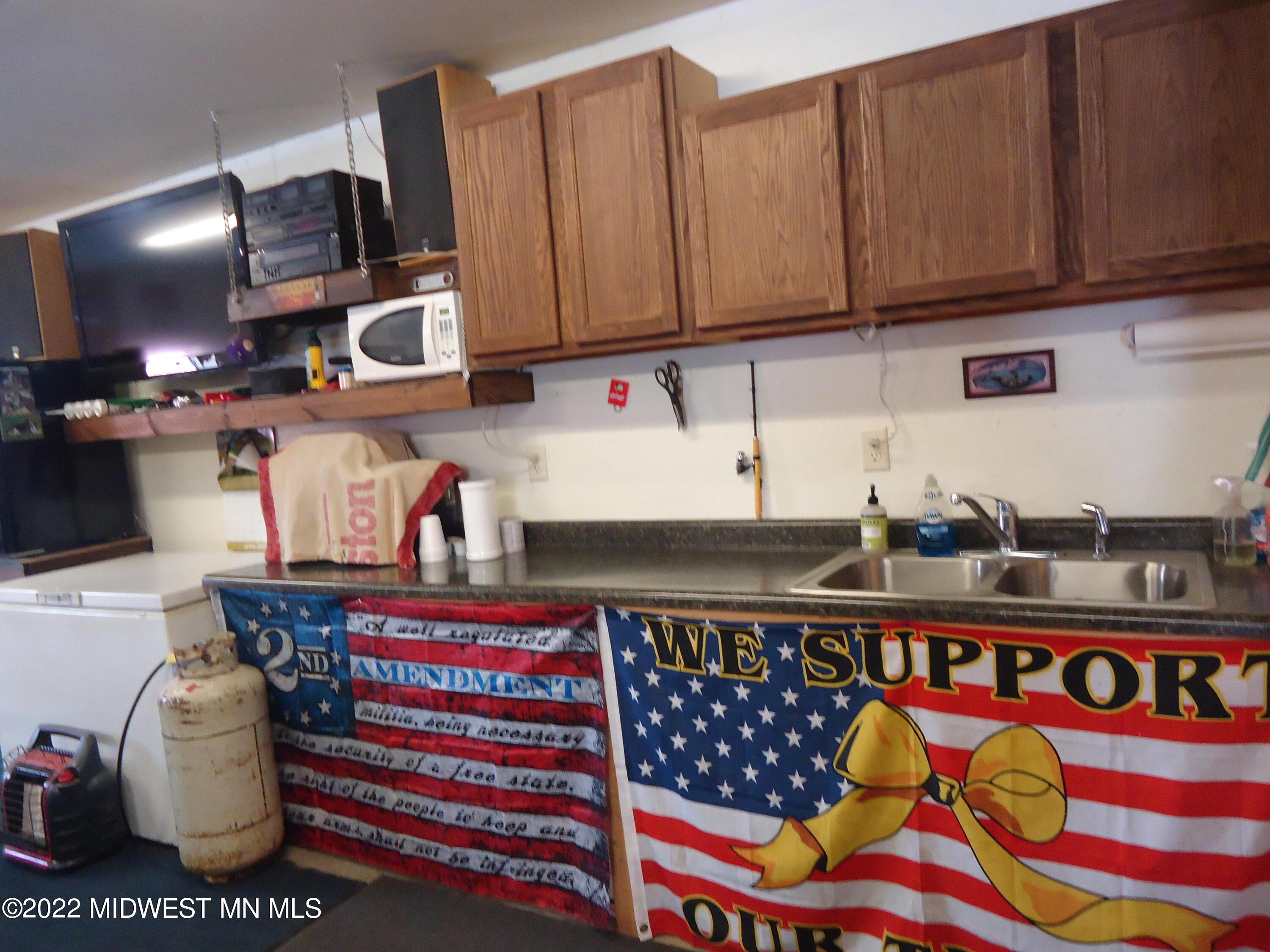 Sink and cabinets in attached garage