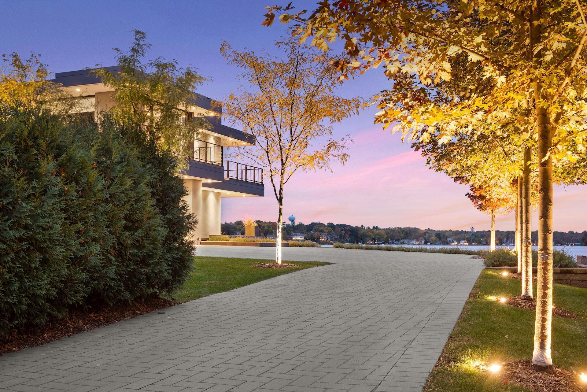 Gated entrance paver driveway