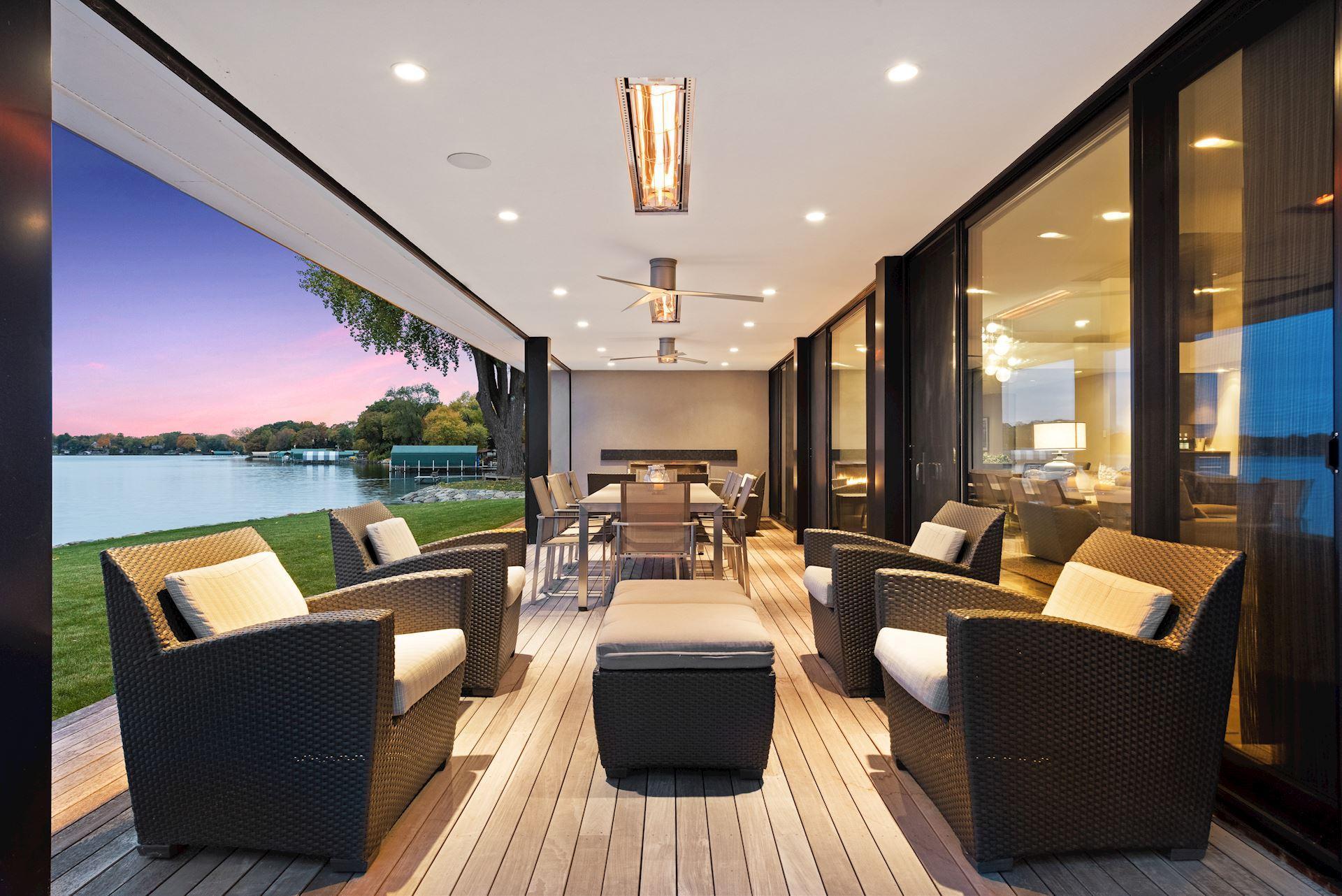 Screen porch with phantom screens, gas fireplace and heaters, almost 3 season