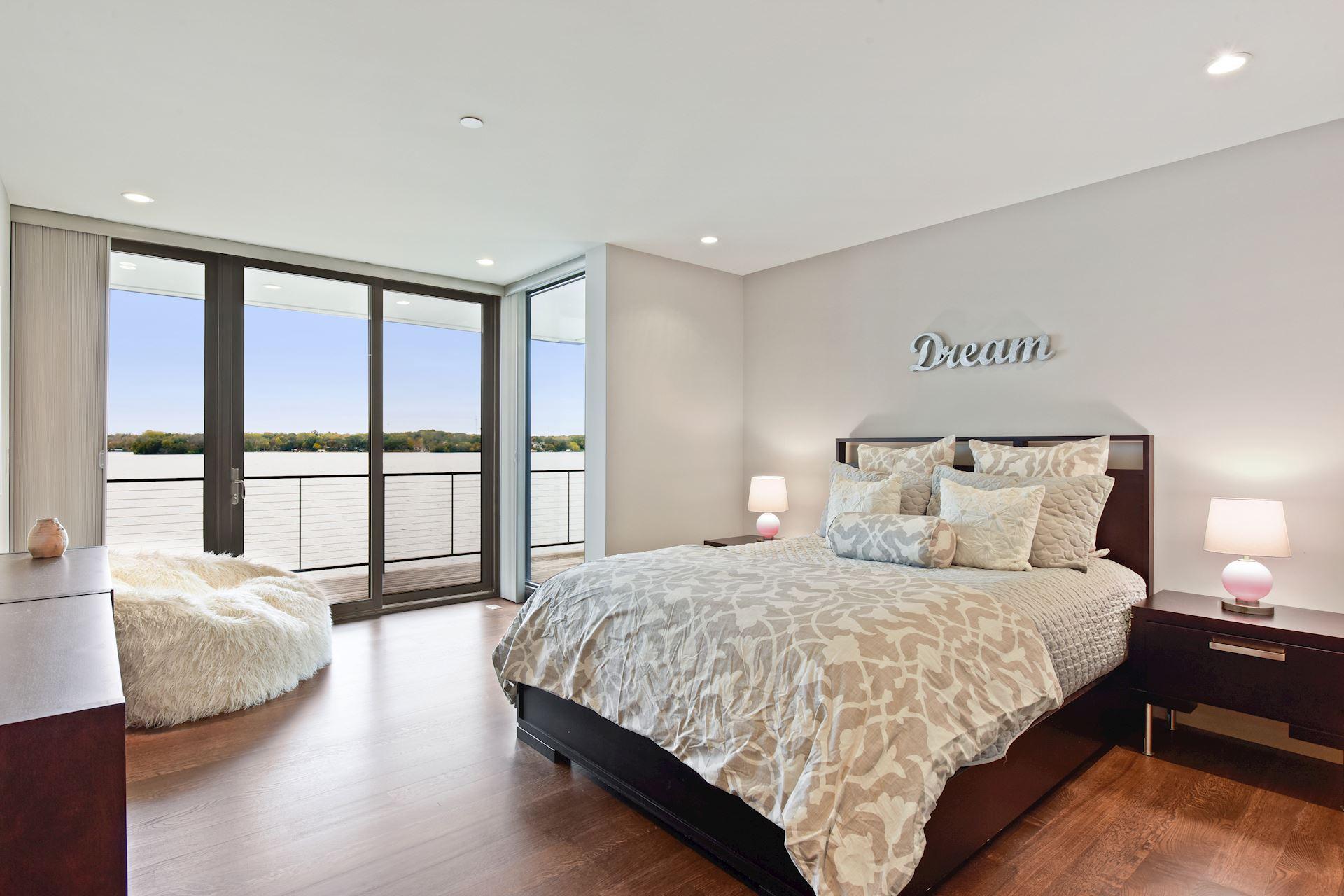 2nd upper bedroom, all bedrooms have a deck and views of the lake