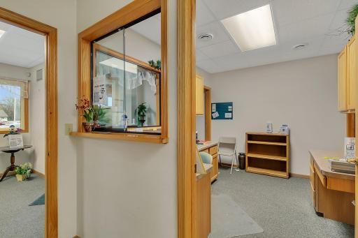Front office resception with glass dividers to lobby-reception