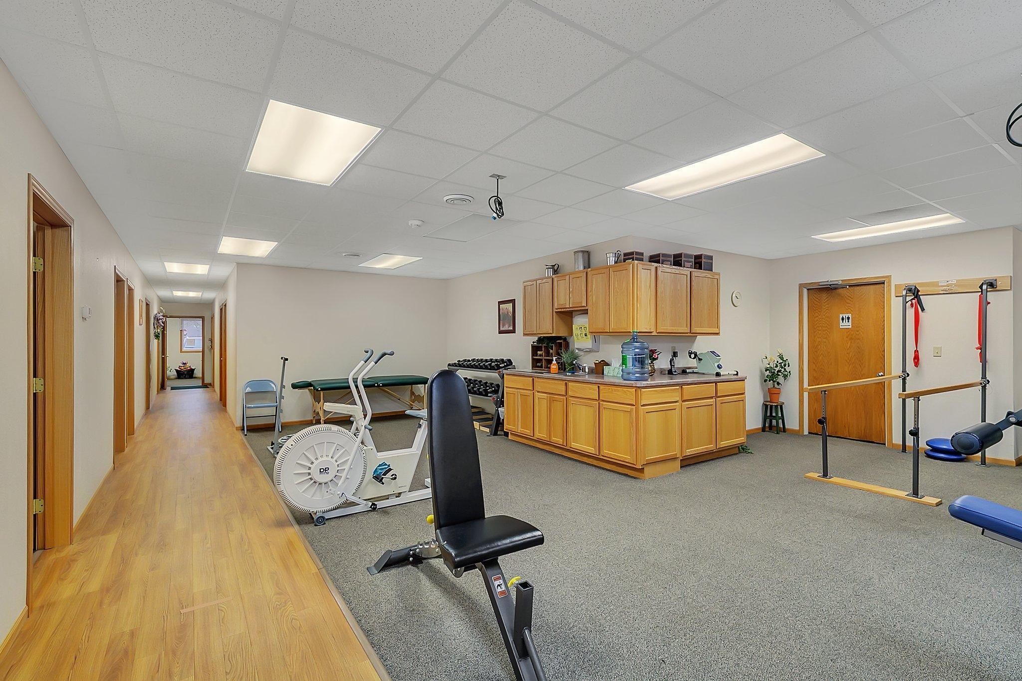 Common open area with offices-treatments rooms on the perimeter