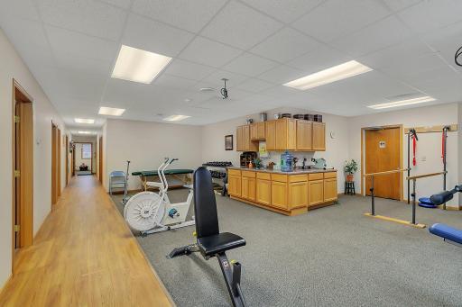 Common open area with offices-treatments rooms on the perimeter