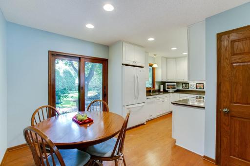 Photo for 3972 Wisconsin Avenue N, New Hope, MN 55427 - Listing #6222379 Eat-in Kitchen leads to impressive backyard.