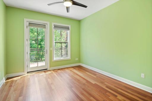 2nd Bedroom with private balcony overlooking courtyard & fountain.