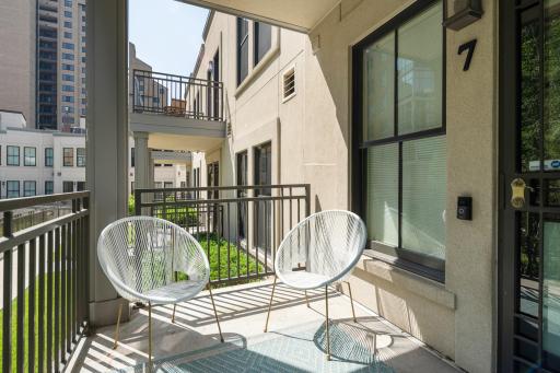 10 Courtyard fountain-side porch at the back entrance.