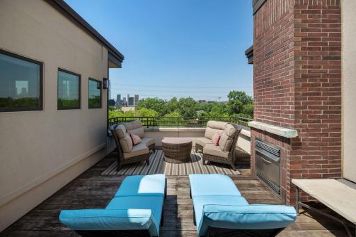 Rooftop deck with stunning views of the river and city skyline.