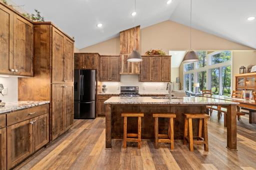 You will love this open concept kitchen and stunning cabinets while cooking and enjoying your time with family and friends.