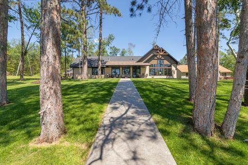 Concrete walk way leads you back to the house after a day boating on the lake