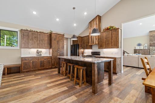 There is an abundant amount of storage for all of your entertaining needs as you gather around the island.