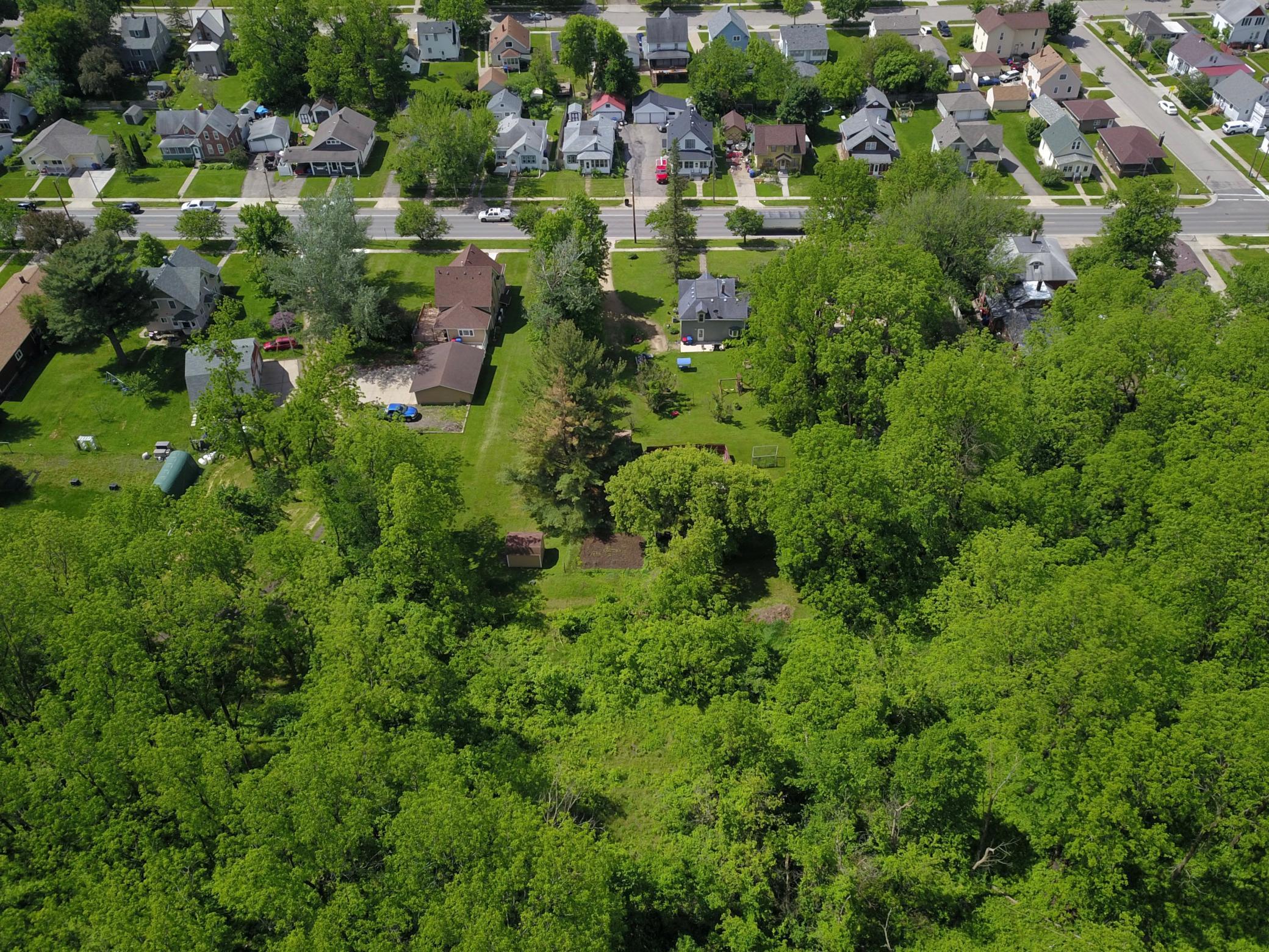 The land is wooded all the way up to Memorial Park on the top of the hill.