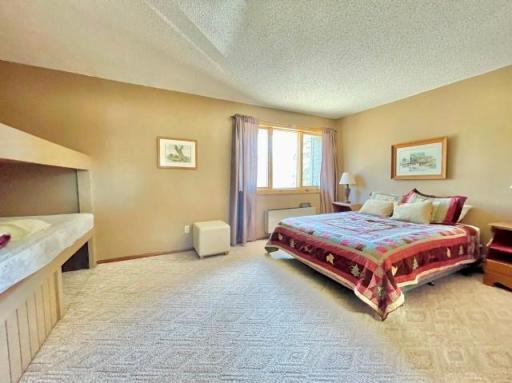 10 U[stairs Bedroom 1 with Bunkbeds.jpeg