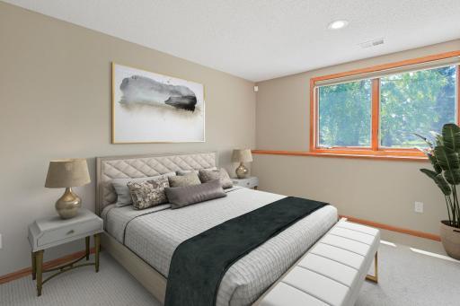 One of Two LL Bedrooms Virtually Staged