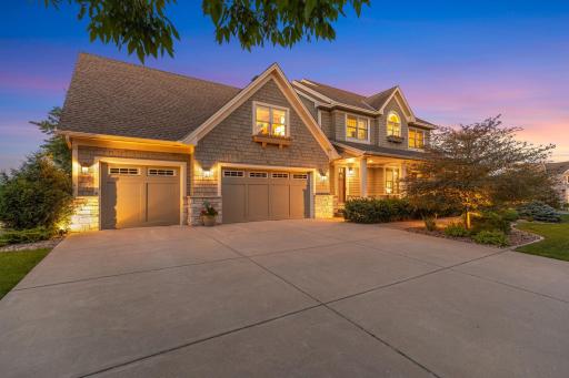 Showcasing quality finishes, distinct craftmanship and stunning curb appeal, the home boasts a manicured lawn, lovely perennial gardens, and a fabulous backyard oasis with a pool and outdoor entertaining spaces.
