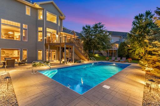 Enjoy the pool with access to the lower level walkout basement. Landscaping designed for privacy around the pool area.