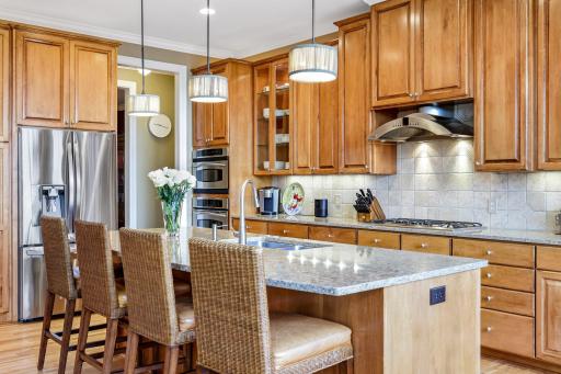 No matter the occasion, this kitchen is ready with upscale amenities, including Cambria quartz counters.