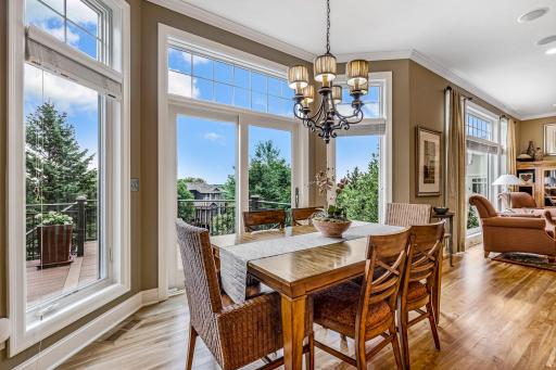 Wall to ceiling windows keep this home light and bright!