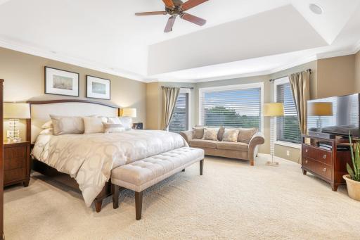 Alluring ownerâs suite highlighted by tray vaulted ceilings and large, bayed windows.