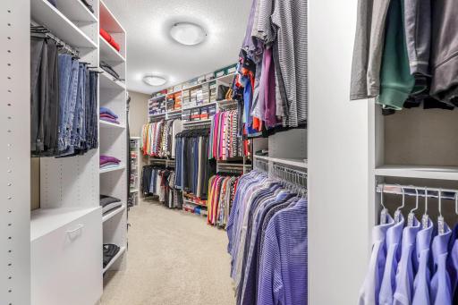 Amazing master closet. Custom closet organizer system. Got clothes?