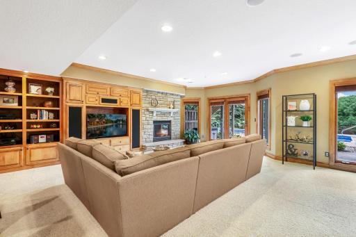 The homeâs lower level is ready & waiting for your next gathering! Stunning millwork takes center stage within these open & light filled entertainment spaces.