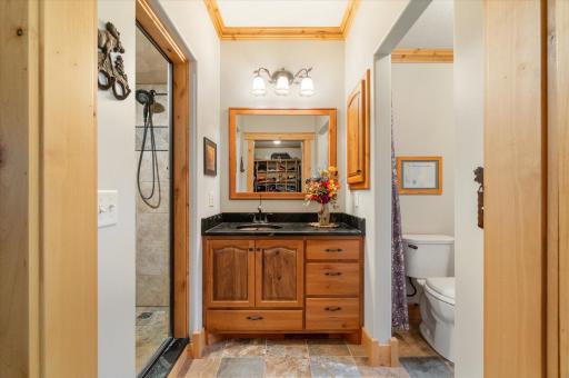 steam shower and vanity in master bathroom