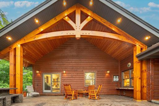 covered lakeside patio with stamped concrete