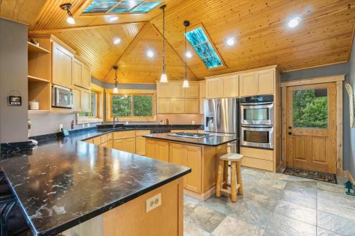 Quartzite (real stone) countertops with 3.5 inch quartzite backsplash