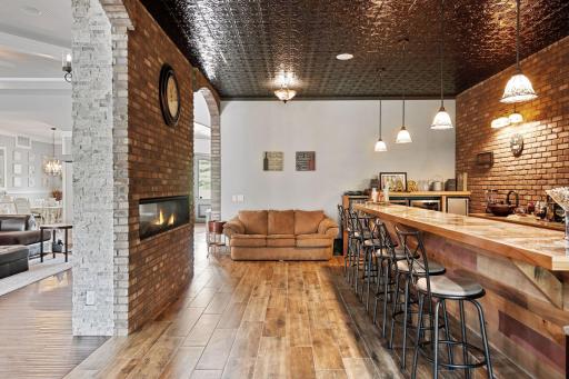 View two of the bar/soda fountain & two sided fireplace